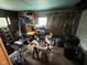 Spacious basement area featuring ample storage, workbench, and natural light from the window at 209 N Lincoln St, Martinsville, IN 46151
