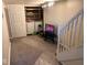 Finished basement area with laundry, TV, and stairs leading to the upper level at 209 N Lincoln St, Martinsville, IN 46151