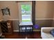 Cozy dining nook with bright window, stylish furnishings, and seamless flow to the living area at 209 N Lincoln St, Martinsville, IN 46151