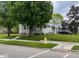 Charming home featuring manicured front lawn and inviting curb appeal, plus convenient street parking at 209 N Lincoln St, Martinsville, IN 46151