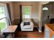 Inviting living room nook with a comfortable chair, small desk, and natural light at 209 N Lincoln St, Martinsville, IN 46151