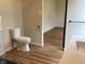 Bathroom featuring modern black fixtures, new flooring, and an open design at 223 E Fordice St, Lebanon, IN 46052