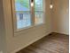 Dining room with wood floors and a view of the backyard at 223 E Fordice St, Lebanon, IN 46052