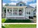 Charming two-story home with a welcoming front porch and well-maintained lawn at 223 E Fordice St, Lebanon, IN 46052