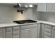The kitchen features granite countertops and a stainless steel gas range at 223 E Fordice St, Lebanon, IN 46052
