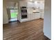 Bright kitchen featuring white cabinets, stainless steel appliances, and modern countertops at 223 E Fordice St, Lebanon, IN 46052
