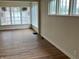Cozy living room with large windows bringing in lots of natural light at 223 E Fordice St, Lebanon, IN 46052