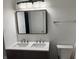 Bathroom vanity with double sink and ample lighting at 2327 Bristol Dr, Franklin, IN 46131