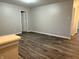 Neutral bedroom featuring wood flooring, neutral walls, and updated lighting at 2327 Bristol Dr, Franklin, IN 46131