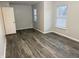 Bedroom featuring hard surface floors, neutral colored walls and two windows at 2327 Bristol Dr, Franklin, IN 46131