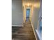 Hallway with hard surface flooring, and neutral colored walls at 2327 Bristol Dr, Franklin, IN 46131