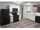 Updated kitchen featuring white cabinetry, granite countertops, stainless steel appliances, and modern fixtures at 2327 Bristol Dr, Franklin, IN 46131