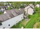 High angle aerial of home featuring a wood deck, and lush, verdant backyard at 2430 Spring Hill Ct, Indianapolis, IN 46268