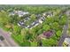 Bird's eye view of homes nestled among mature trees, highlighting the peaceful and green environment of the area at 2430 Spring Hill Ct, Indianapolis, IN 46268