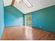 Primary bedroom with a sliding glass door that opens to a balcony at 2430 Spring Hill Ct, Indianapolis, IN 46268