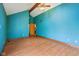 Bedroom with light laminate floors and a vaulted ceiling at 2430 Spring Hill Ct, Indianapolis, IN 46268