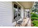 Inviting front porch with bench seating and a view of the neighborhood at 2430 Spring Hill Ct, Indianapolis, IN 46268
