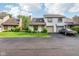 Charming condo with a single car garage and well manicured lawn at 2430 Spring Hill Ct, Indianapolis, IN 46268