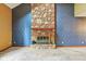 A close up of a stone fireplace in a spacious living room at 2430 Spring Hill Ct, Indianapolis, IN 46268