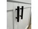 Close-up of matte black hardware on kitchen cabinets at 2431 Timbercrest Dr, Columbus, IN 47203