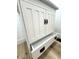 Close-up of white bathroom vanity featuring an open drawer and dark hardware at 2431 Timbercrest Dr, Columbus, IN 47203