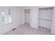 A bedroom featuring walk-in closets and a window, offering great natural light and storage at 2708 N Buck Creek Rd, Greenfield, IN 46140