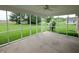 Enjoy the views from this screened in porch that allows for outdoor living without the bugs at 2708 N Buck Creek Rd, Greenfield, IN 46140