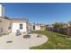 Relaxing backyard featuring a patio, fire pit, seating, a storage shed, and a well-maintained lawn at 2761 Winding Creek Ln, Greenfield, IN 46140