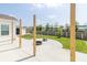 Backyard patio, shed, full lawn, and new home construction at 2761 Winding Creek Ln, Greenfield, IN 46140