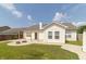 Spacious backyard with a concrete patio, perfect for outdoor entertaining and relaxation at 2761 Winding Creek Ln, Greenfield, IN 46140