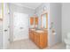 Bathroom with double sink vanity, tile floor and toilet at 2761 Winding Creek Ln, Greenfield, IN 46140