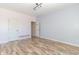 Spacious bedroom with wood-look floors, neutral walls, and ample natural light at 2761 Winding Creek Ln, Greenfield, IN 46140