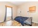 Bedroom featuring a window for natural light and neutral walls to create a peaceful environment at 2761 Winding Creek Ln, Greenfield, IN 46140