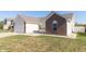Charming single-Gathering home with brick and vinyl siding and a well-manicured lawn at 2761 Winding Creek Ln, Greenfield, IN 46140