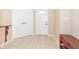 Inviting foyer featuring tile flooring, a storage closet, and natural light at 2761 Winding Creek Ln, Greenfield, IN 46140