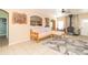 Cozy living room with tile flooring, fireplace and view of kitchen through an arch at 2761 Winding Creek Ln, Greenfield, IN 46140