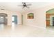 Expansive living room featuring tile flooring, neutral walls, and an open floor plan at 2761 Winding Creek Ln, Greenfield, IN 46140