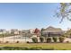 Community pool with ample seating and a covered area, surrounded by a wrought iron fence at 2761 Winding Creek Ln, Greenfield, IN 46140