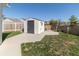 The backyard includes a shed with a sturdy door, ideal for storing outdoor equipment at 2761 Winding Creek Ln, Greenfield, IN 46140