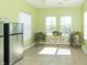 Sunroom with tiled floor and plants and sunlight at 2761 Winding Creek Ln, Greenfield, IN 46140