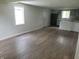 Living room with modern flooring and an abundance of natural light at 2855 Walker Ave, Indianapolis, IN 46203