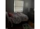 Bedroom with bed, dresser and window with blinds at 2928 Cicero Rd, Noblesville, IN 46060