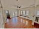 Bright living room featuring hardwood floors, ample natural light, and French doors leading to the backyard at 2940 N Park Ave, Indianapolis, IN 46205