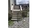 Back yard stairwell with stone and gravel yard at 3031 E 38Th St, Indianapolis, IN 46218