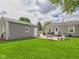 Spacious backyard with detached garage and ample room for outdoor activities at 3140 W 18Th St, Anderson, IN 46011