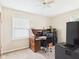 Cozy office with wooden desk, rolling chair, filing cabinet, and natural light at 3140 W 18Th St, Anderson, IN 46011