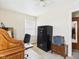 Well-lit office with a classic desk, safe, and printer, creating a functional workspace at 3140 W 18Th St, Anderson, IN 46011