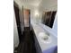 Bathroom featuring double sinks, a mirror, and dark floors at , Indianapolis, IN 46227