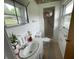 Bright bathroom featuring a shower and a white toilet at 3232 St Jude Dr, Indianapolis, IN 46227