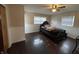 Bedroom featuring hardwood floors, ceiling fan, and two windows at 3232 St Jude Dr, Indianapolis, IN 46227